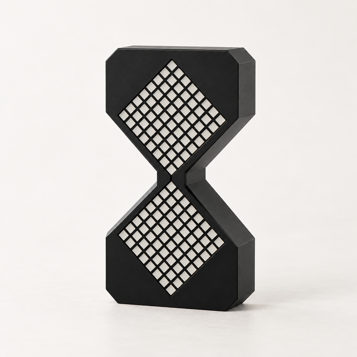 Black Tovi LED hourglass night light with the light off