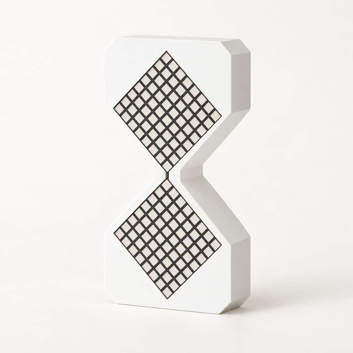White Tovi LED hourglass night light with the light off
